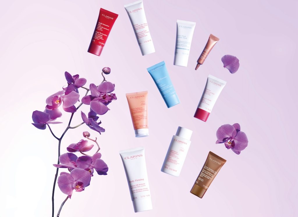 Clarins big beauty gift poster, your choice of 4 treats when you purchase 2 or more Clarins products, one to be skincare or foundation